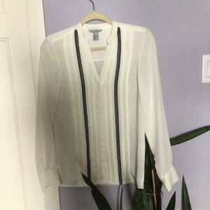 H&M ivory blouse with black lace. New condition.